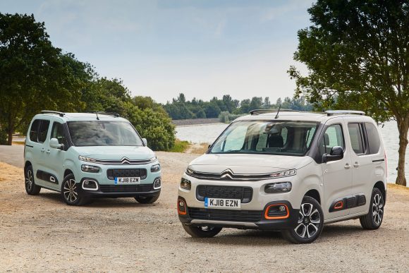 Citroen Berlingos parked up near a lake