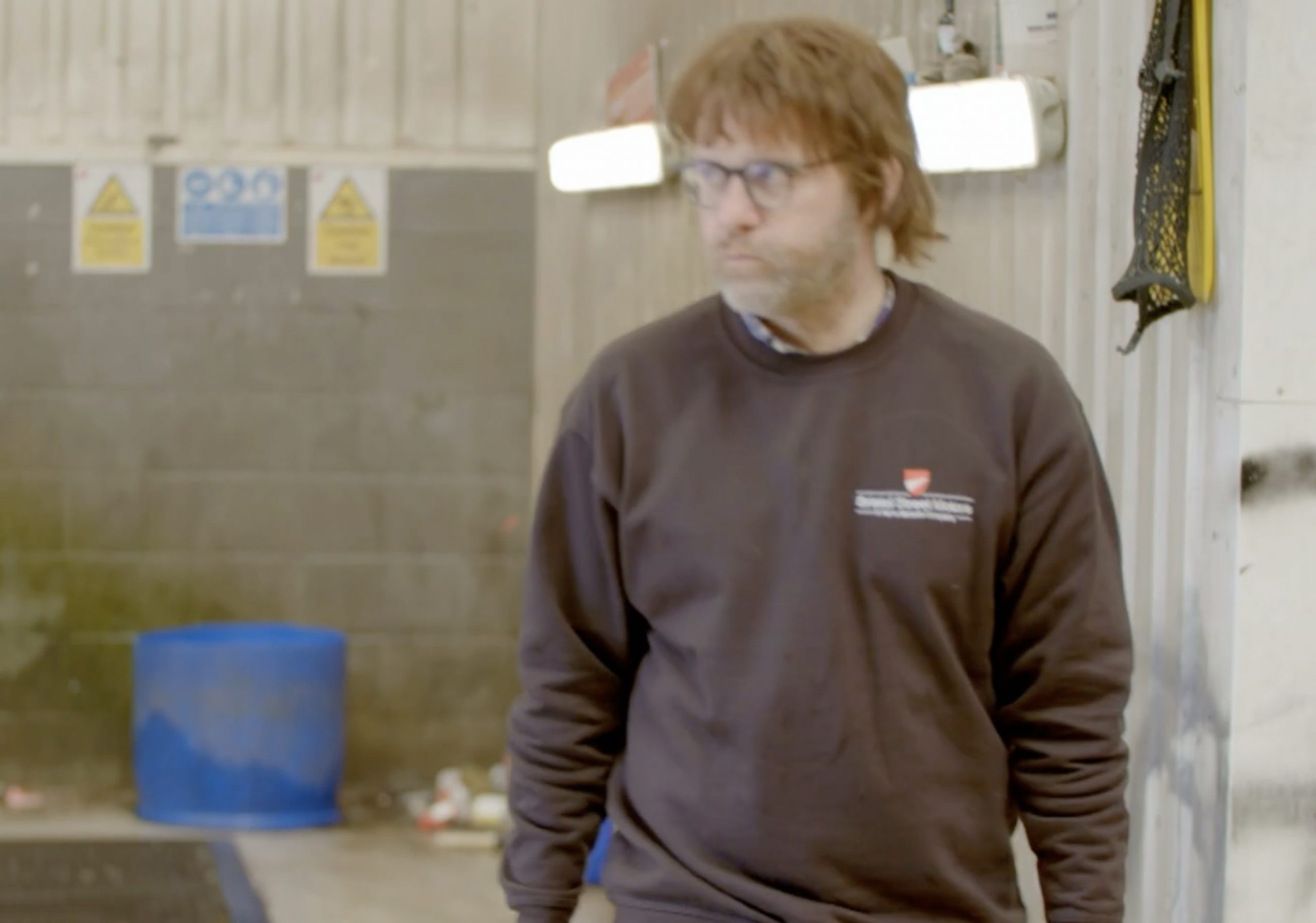 Robert Forrester in disguise for Undercover Big Boss, trailer screengrab JPEG