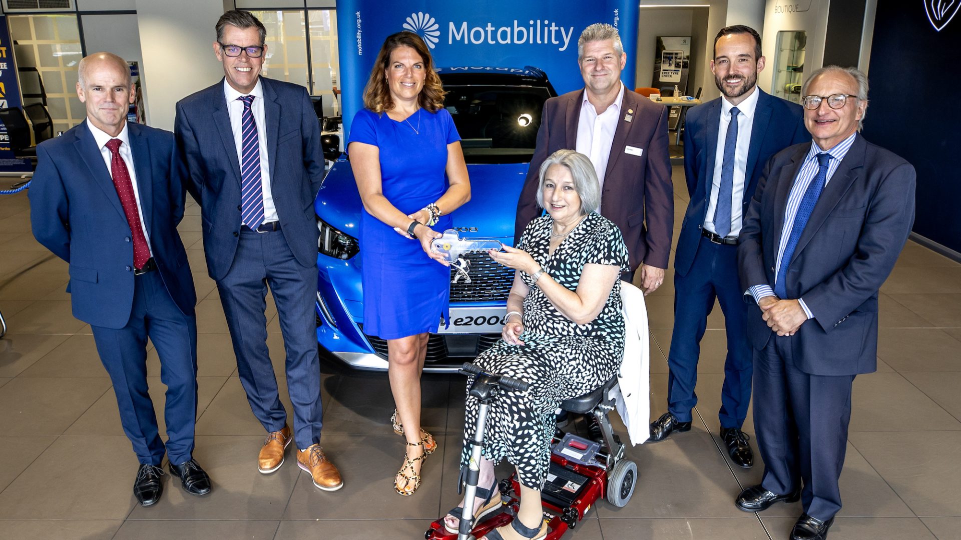 Car dealer Snows welcomes local MP to learn how Motability Scheme has ...